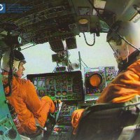 Экипаж в кабине вертолета Ка-32. 1980-е гг. РГАНТД. Ф. 348. Оп. 3. Д. 273. Л. 3об.